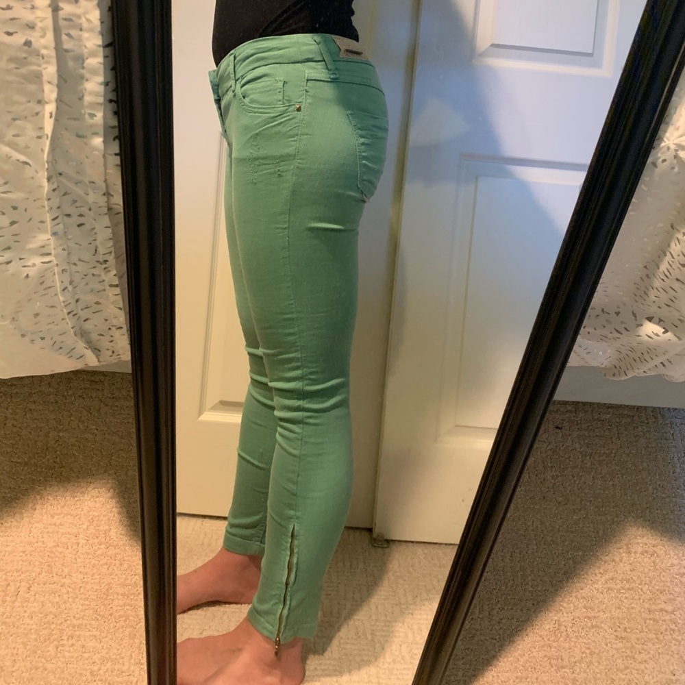 Sea foam green jeans with zipper detailing